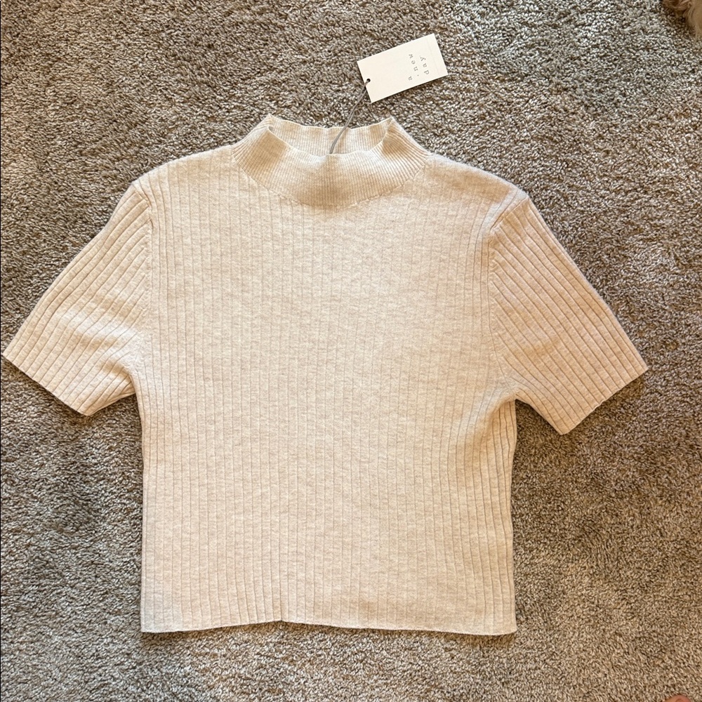 a new day Short Sleeve Ribbed Mock Neck Bodysuit in Beige